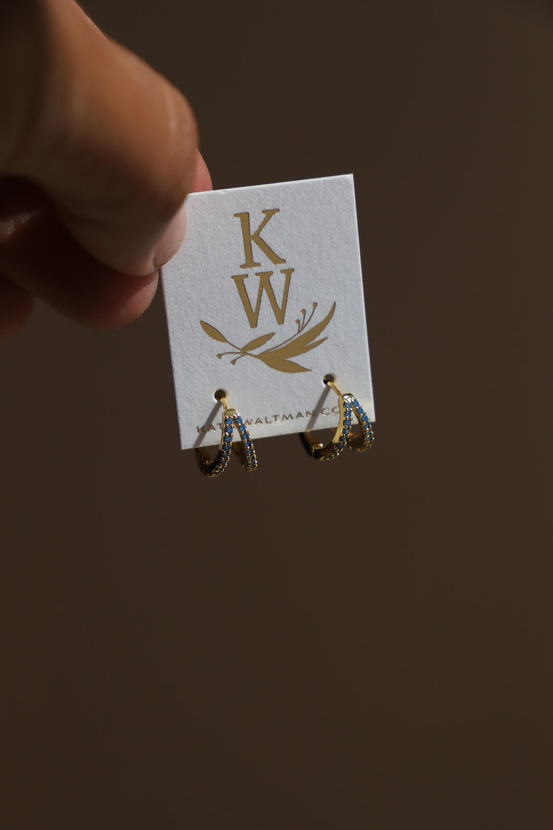 DOUBLE CZ HUGGIE HOOPS-BLUE