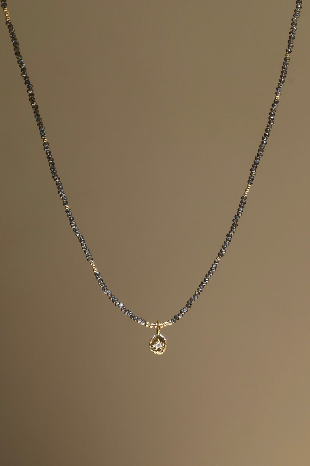 SIKA STAR AND SMOKY BEADED NECKLACE