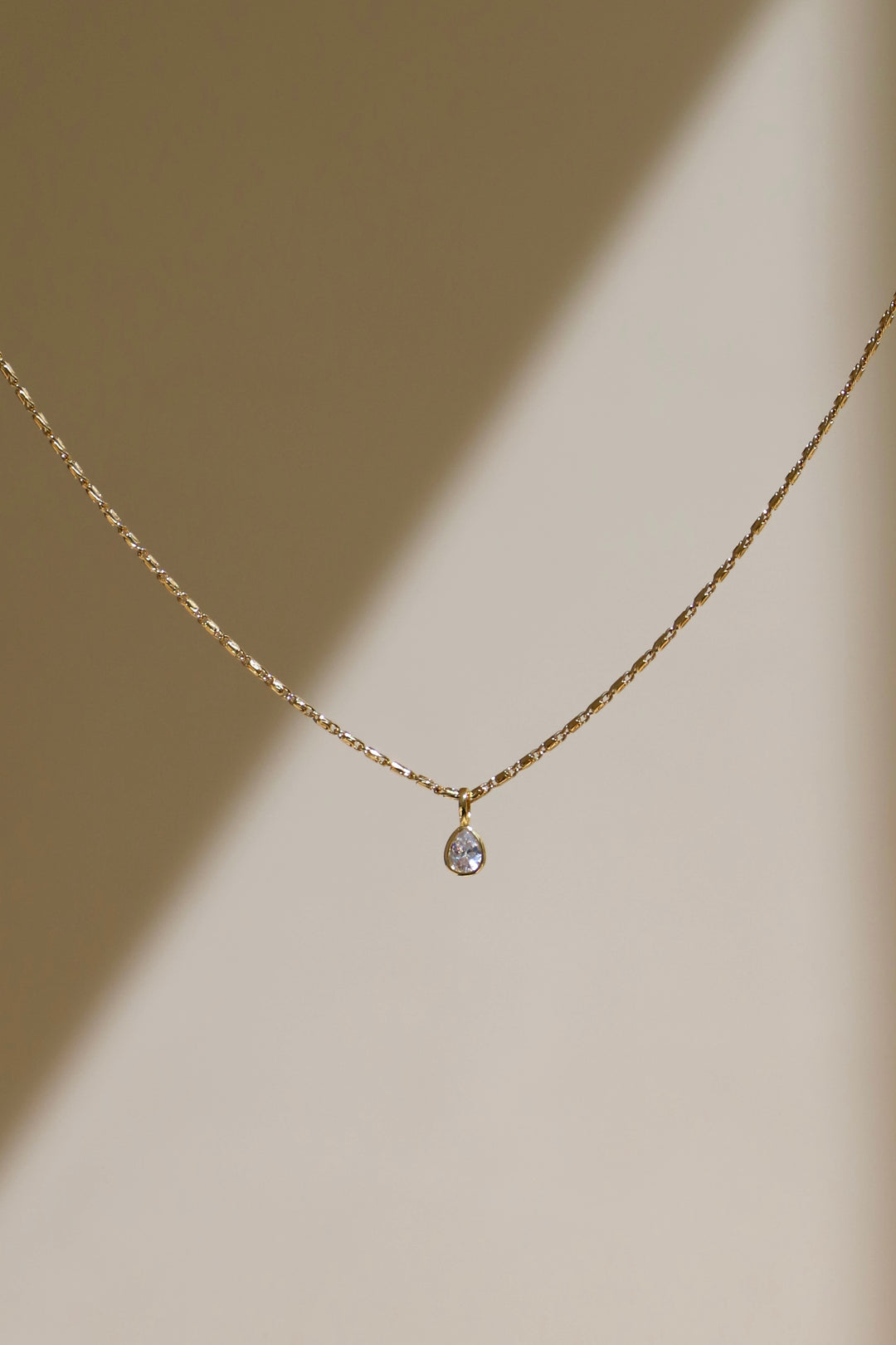 APRIL TEARDROP BEZEL NECKLACE
