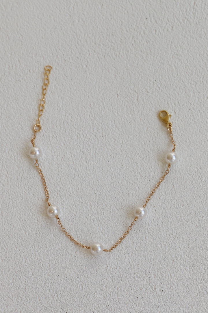 GOLD PEARL STATION BRACELET