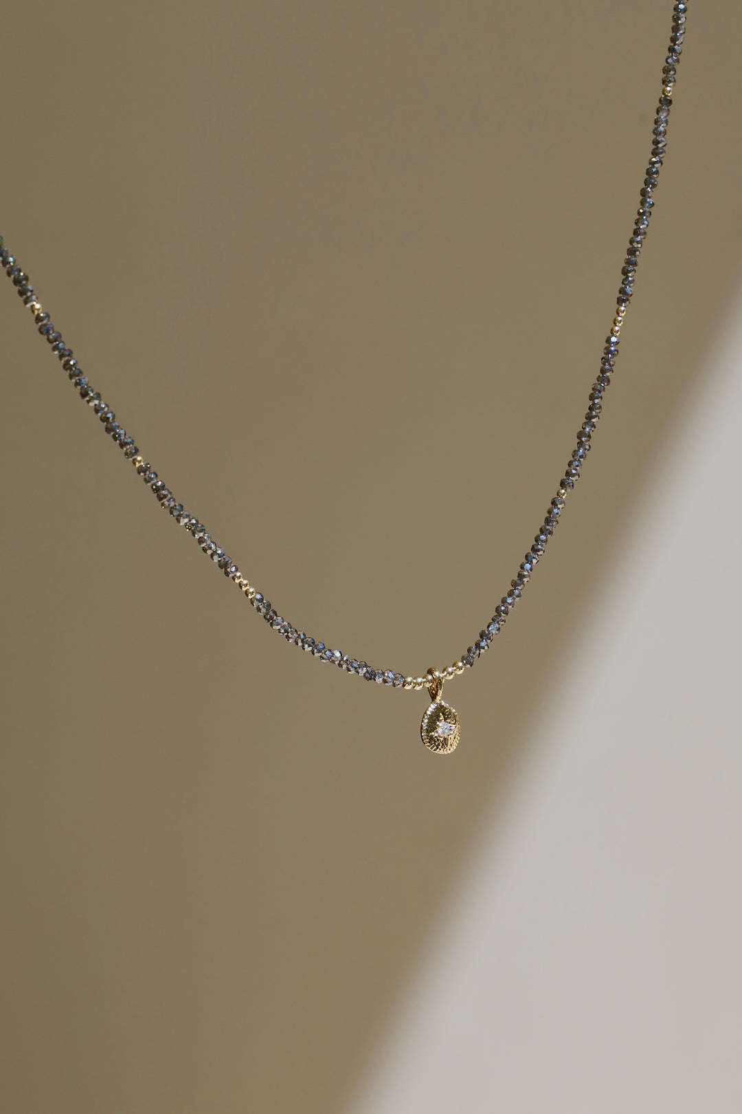 SIKA STAR AND SMOKY BEADED NECKLACE