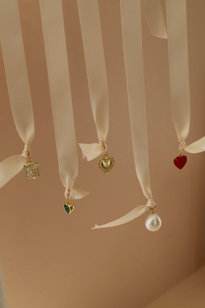 VINTAGE HEART AND CROSS CHARM