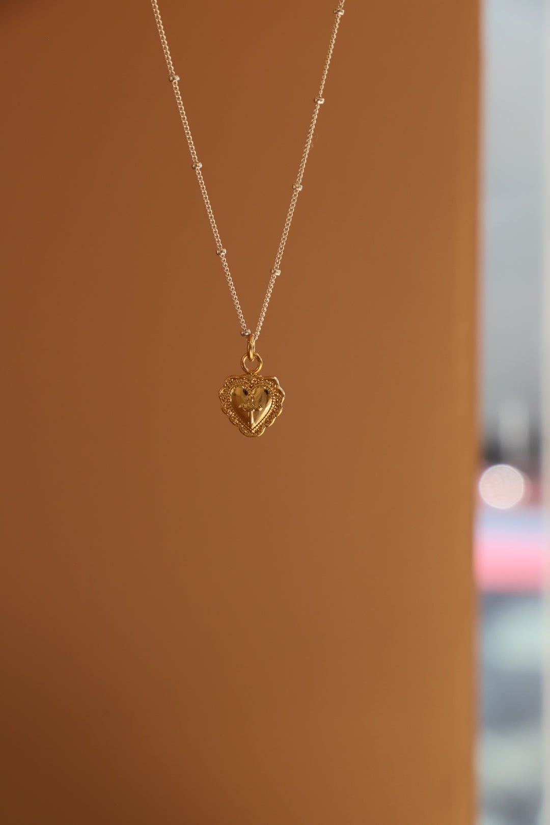 VINTAGE HEART AND CROSS CHARM