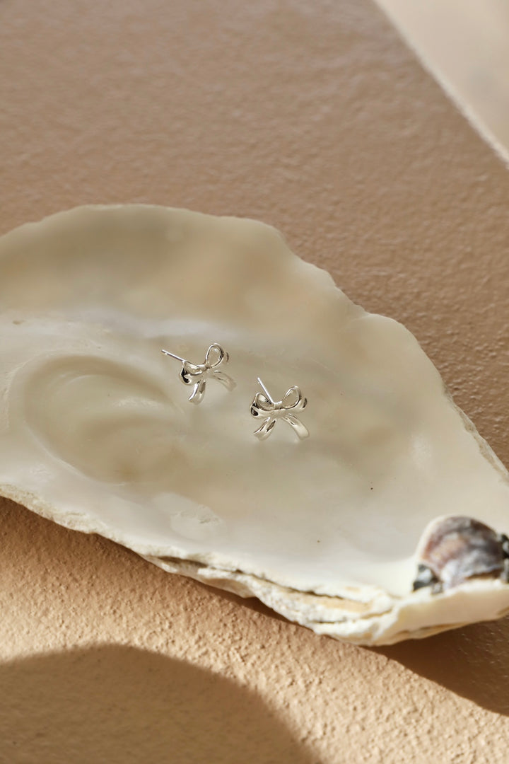 PETITE BOW STUDS- SILVER