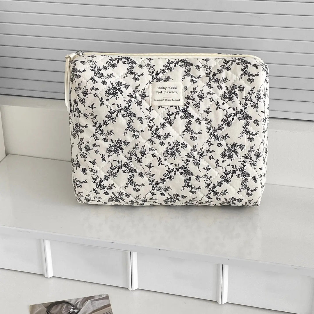 QUILTED FLORAL MAKEUP POUCH
