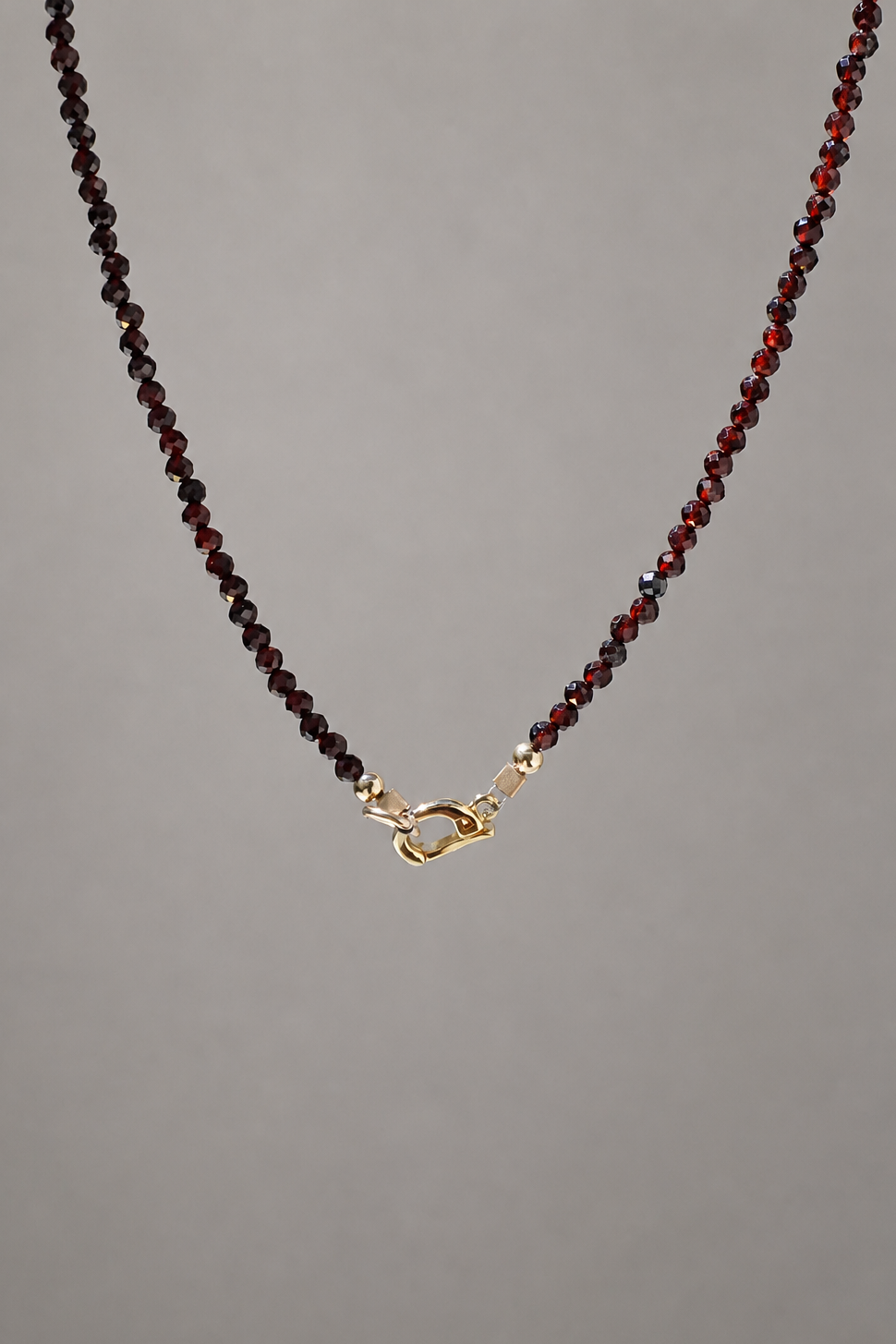 GARNET CHARM HOLDER NECKLACE