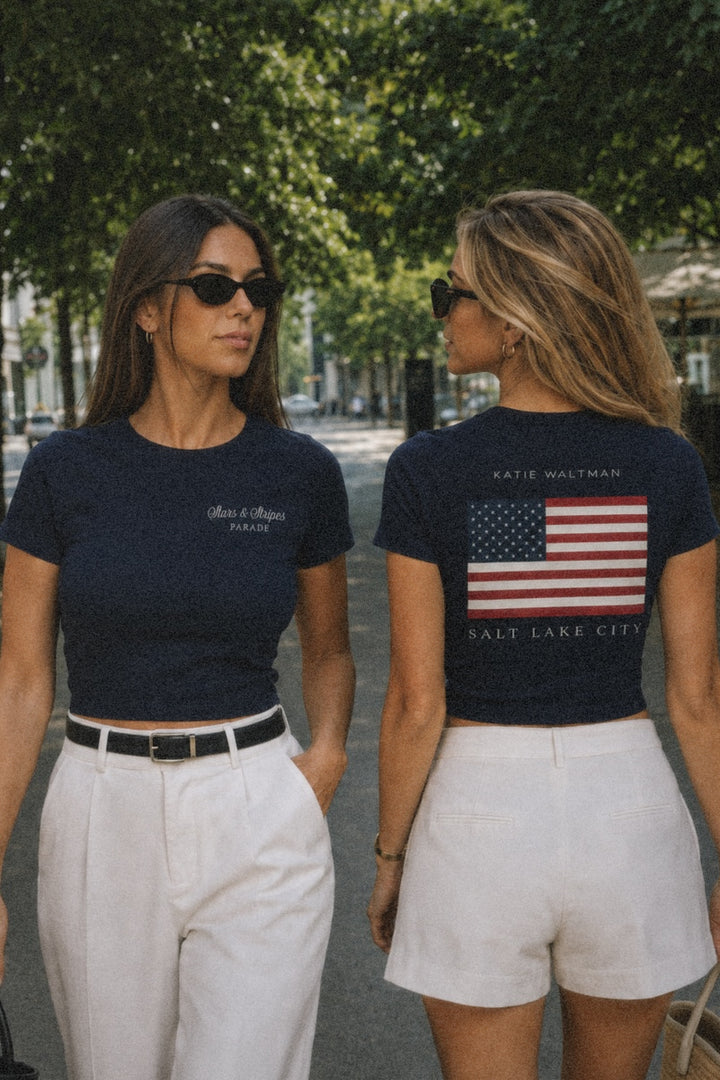 WOMEN'S BABY TEE- PARADE