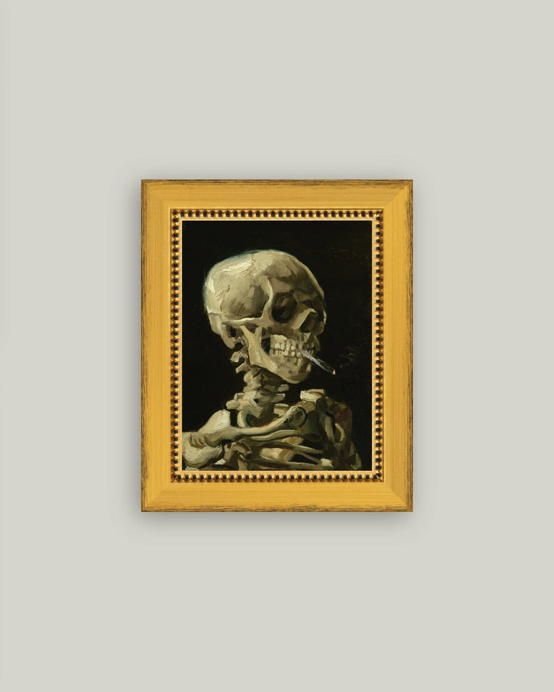 SKULL WITH CIGARETTE FRAMED ART