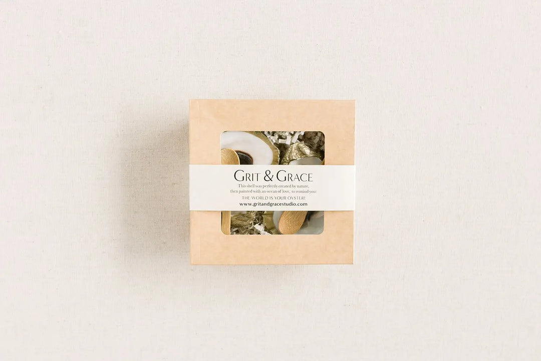 GILDED OYSTER SALT AND PEPPER CELLARS