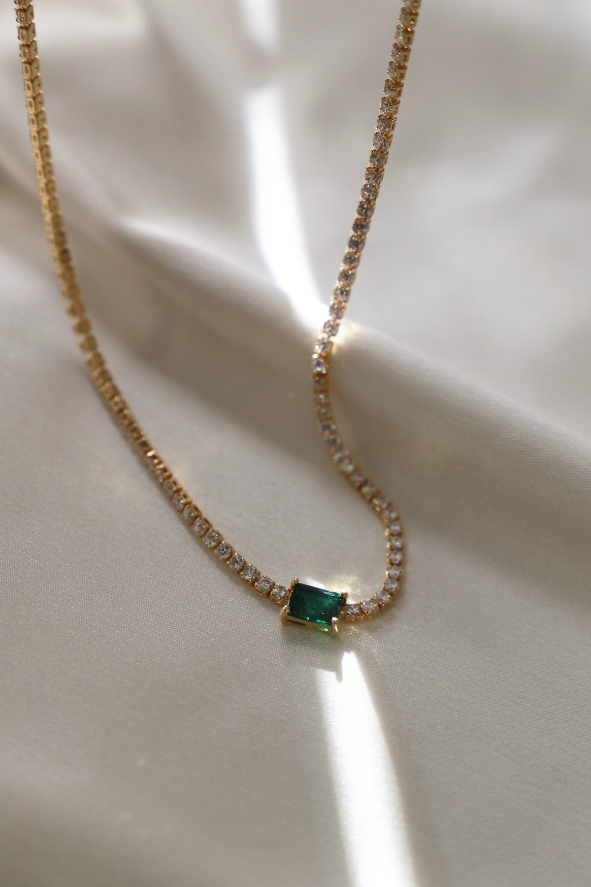 Necklace with on sale emerald pendant