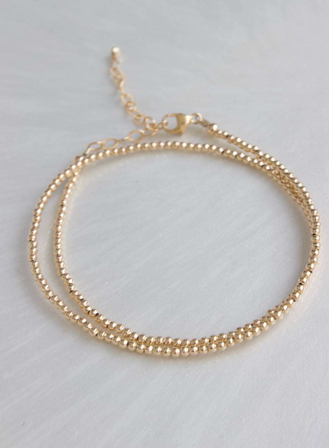 Gold Suede Wrap Bracelet with Flashy Gold Rhinestones